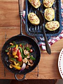 Steak sides: fried vegetables and baked potatoes
