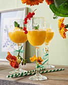 Passion fruit daiquiri garnished with flowers