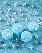 Pastel-blue christening cupcakes