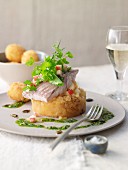 Sturgeon fillet steamed in apple wine on honey turnips with Frankfurt pesto and small, breaded potatoes