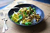 Turkey curry with almonds and coriander on a bed of rice