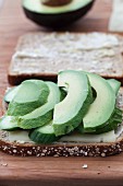 A summer sandwich with avocado, cucumber and cheese