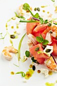Prawns with melon and feta cheese (close-up)