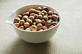 Hazelnuts in a porcelain bowl