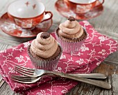 Cafe latte cupcakes on a fabric napkin