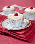 White chocolate cupcakes with raspberries