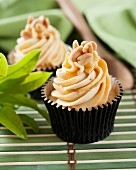 Cupcakes with peanut butter cream and caramel