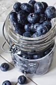 A jar of fresh blueberries