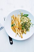 Asparagus with orange sauce and couscous