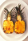 Roasted pineapple halves (seen from above)