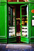 Green-painted front door of restaurant