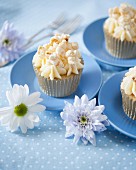 Caramel popcorn cupcakes decorated with flowers