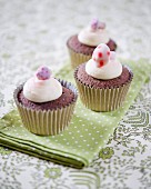 Chocolate cupcakes decorated with mushroom sweets