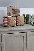 Decorative cubes and letters on top of cabinet