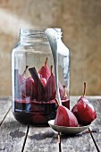 A jar of red wine pears
