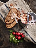 Obatzter cheese with brown bread and radishes