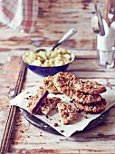 Vegetable escalopes with a walnut crust served with potato salad