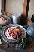A buckwheat crepe with goat's cheese and beetroot