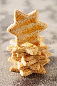 A stack of star shaped biscuits with one standing on edge