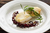 Halibut with a seed oil and lingonberry sauce