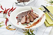 Duck breast with a chilli and chocolate sauce