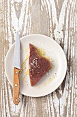 Raw tuna steak with olive oil, salt and pepper