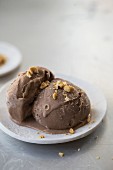 Chocolate ice cream with chopped nuts