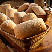 Ciabatta rolls in a wooden basket