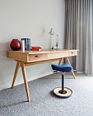 Wooden desk and ergonomic 'Move' standing stool