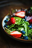 Green salad with rocket and berries