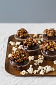 Chocolate cupcakes with caramelised popcorn