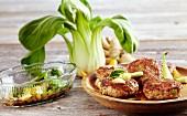 Ginger fritters with bok choy