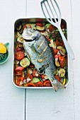 Seabream on a bed of vegetables