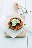 Tomato tartlet with olives and sheep's cheese