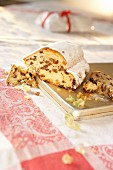 Stollen with icing sugar, sliced
