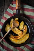 Caramelised bananas in a pan