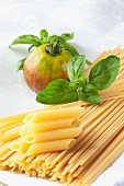 Linguine, penne, basil and an organic tomato