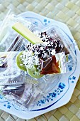 Balinese breakfast: black rice with palm sugar and pastry parcels