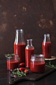 Sieved tomatoes in jars and bottles