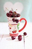 Fresh cherries in a cup