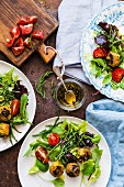 A salad with black tomatoes, samphire and vegetarian meatballs