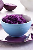 A bowl of red cabbage salad