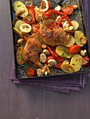Oven-roasted pepper chicken with potatoes and mushrooms