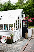 Greenhouse with weatherboard lower façade