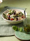 Italian rice salad with dried tomatoes and olives