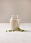 Vegan soya milk in a screw-top jar