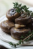 Marinated mushrooms with fresh thyme, black caraway and garlic
