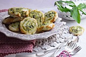 Puff pastry spirals with a spinach, wild garlic and basil pesto filling