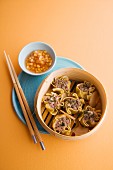 Steamed duck wontons with peach sambal (Asia)