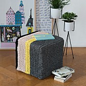 Knitting with a crochet needle: stool with knooked cover